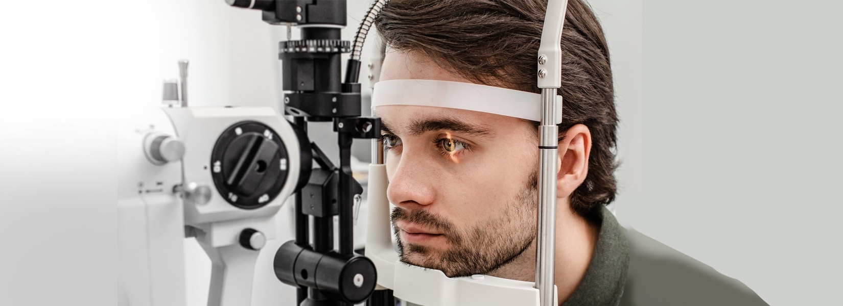 young man during eye exam in Dover